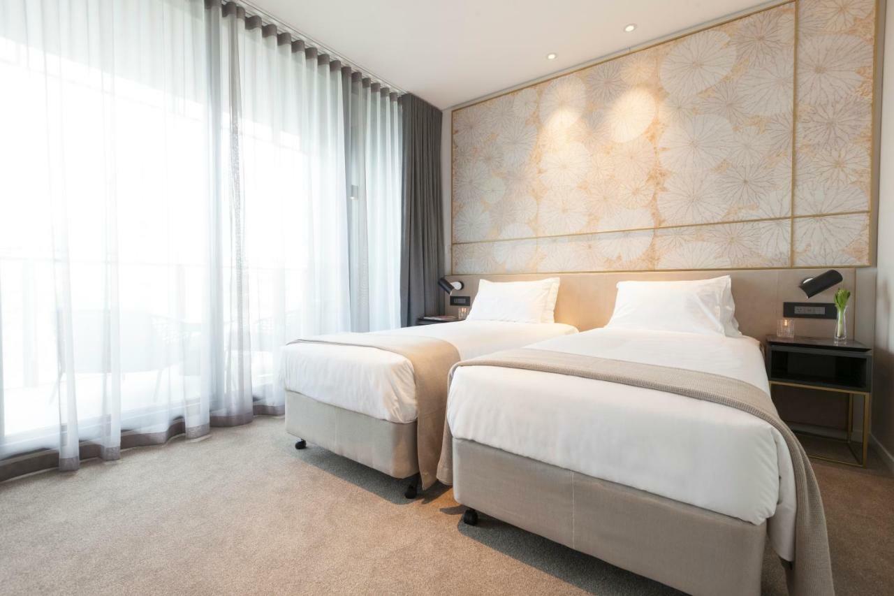 One Global Resorts Green Square Sydney Eksteriør billede Deluxe Room