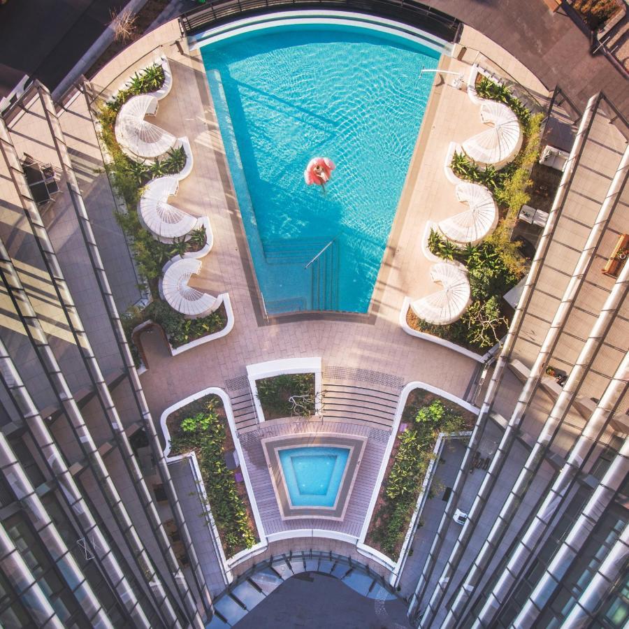 One Global Resorts Green Square Sydney Eksteriør billede The pool at the 1018